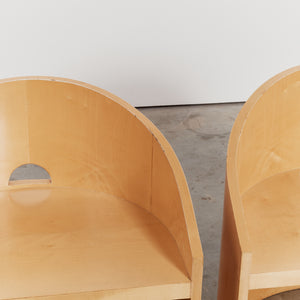 Pair of curved Italian chairs