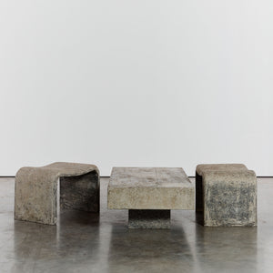 Concrete outdoor table and sculptural stools