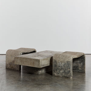 Concrete outdoor table and sculptural stools