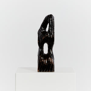 Chiseled biomorphic wood sculpture