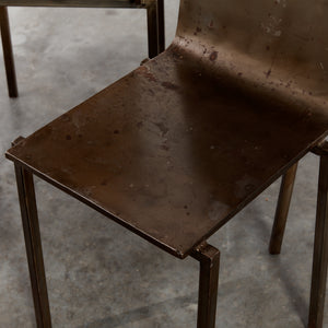 French patinated steel dining chairs