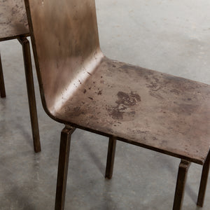 French patinated steel dining chairs