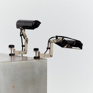 Pair of black steel clip-on desk lights