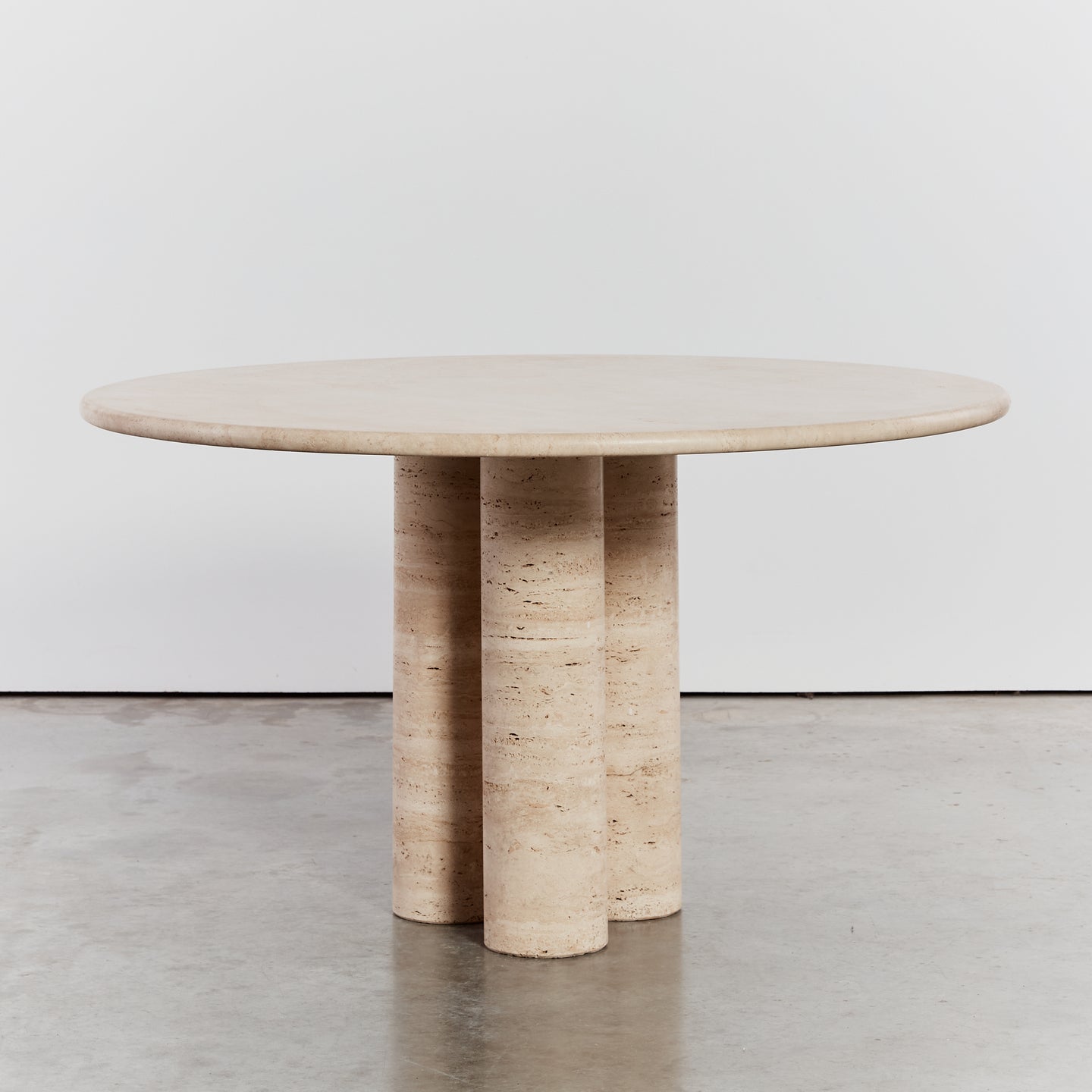 Classic column trio dining table by Mario Bellini