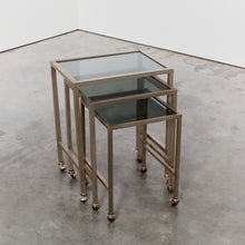 Load image into Gallery viewer, Trio of nesting tables on castors
