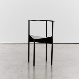 Wendy Wright chairs in matt black by Philippe Starck