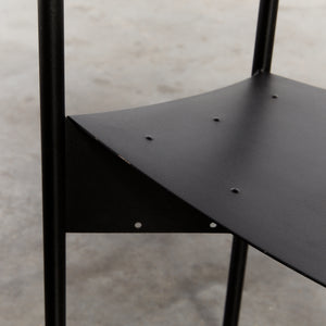 Wendy Wright chairs in matt black by Philippe Starck