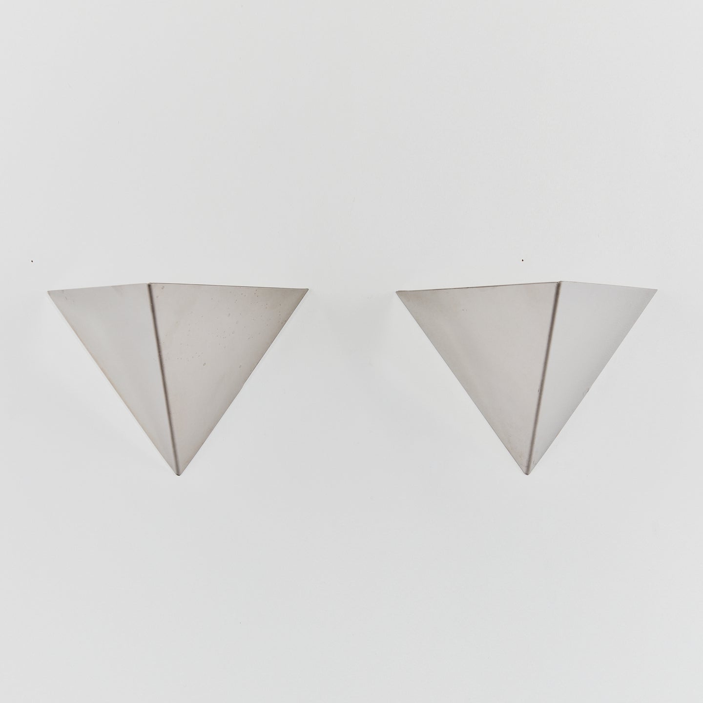 Pair of triangular steel sconces