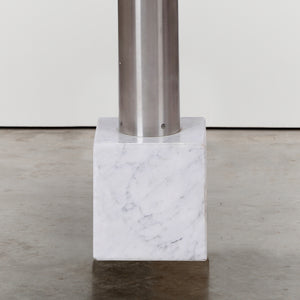 Steel uplighter on marble plinth base
