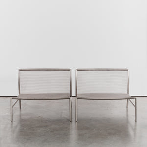 Steel and leather loungers by Piero Lissoni