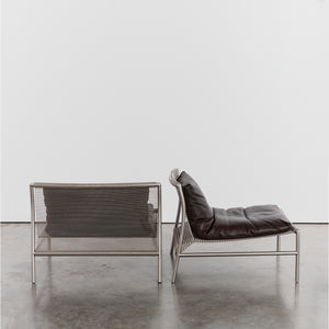 Steel and leather loungers by Piero Lissoni