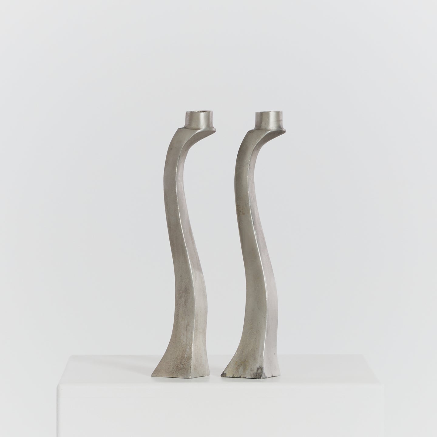 Aluminium curved candlesticks, pair - HIRE ONLY