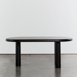 Ebonised dining table with tripod column legs