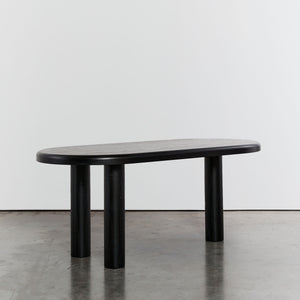 Ebonised dining table with tripod column legs