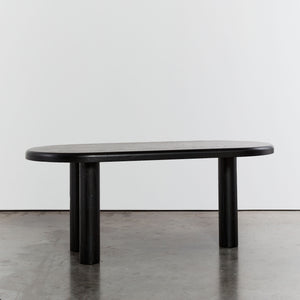 Ebonised dining table with tripod column legs