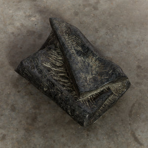 Stone sculpture with folded textile form - medium