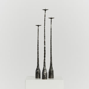Trio of brutalist iron candlesticks