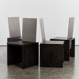 Cubist steel back ebonised chairs