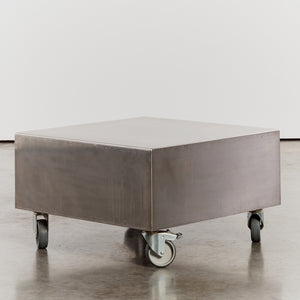Stainless steel coffee table with castors