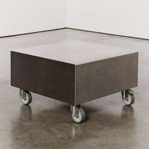 Stainless steel coffee table with castors