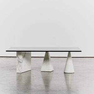 White marble table with black glass