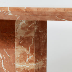 Rojo Coralito marble faceted dining table