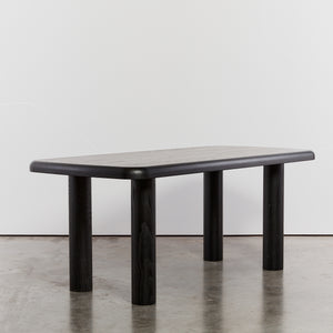 Ebonised dining table with column legs