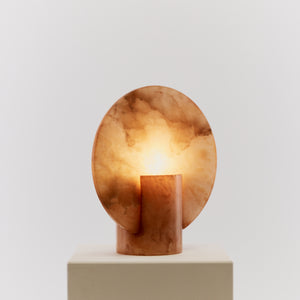 Alabaster disc lamps in amber tones
