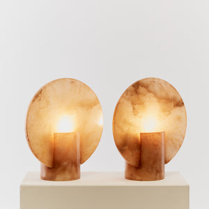 Alabaster disc lamps in amber tones
