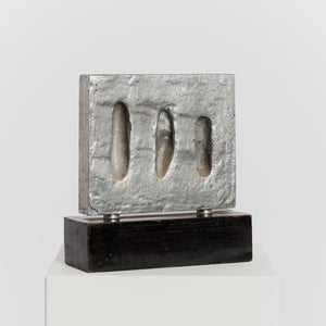 Modernist pewter slab sculpture, signed