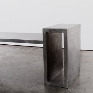 Metallic zinc bench with side table