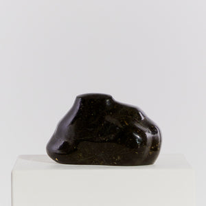 Biomorphic cloud-like black stone sculpture
