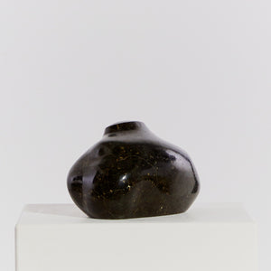 Biomorphic cloud-like black stone sculpture