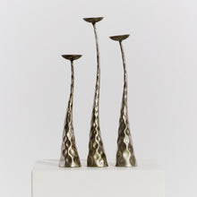 Load image into Gallery viewer, Trio of textured metal candlesticks
