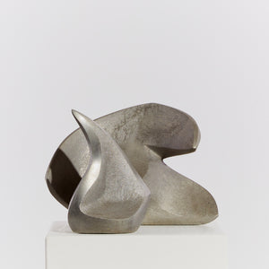 Pair of cast metal abstract sculptures