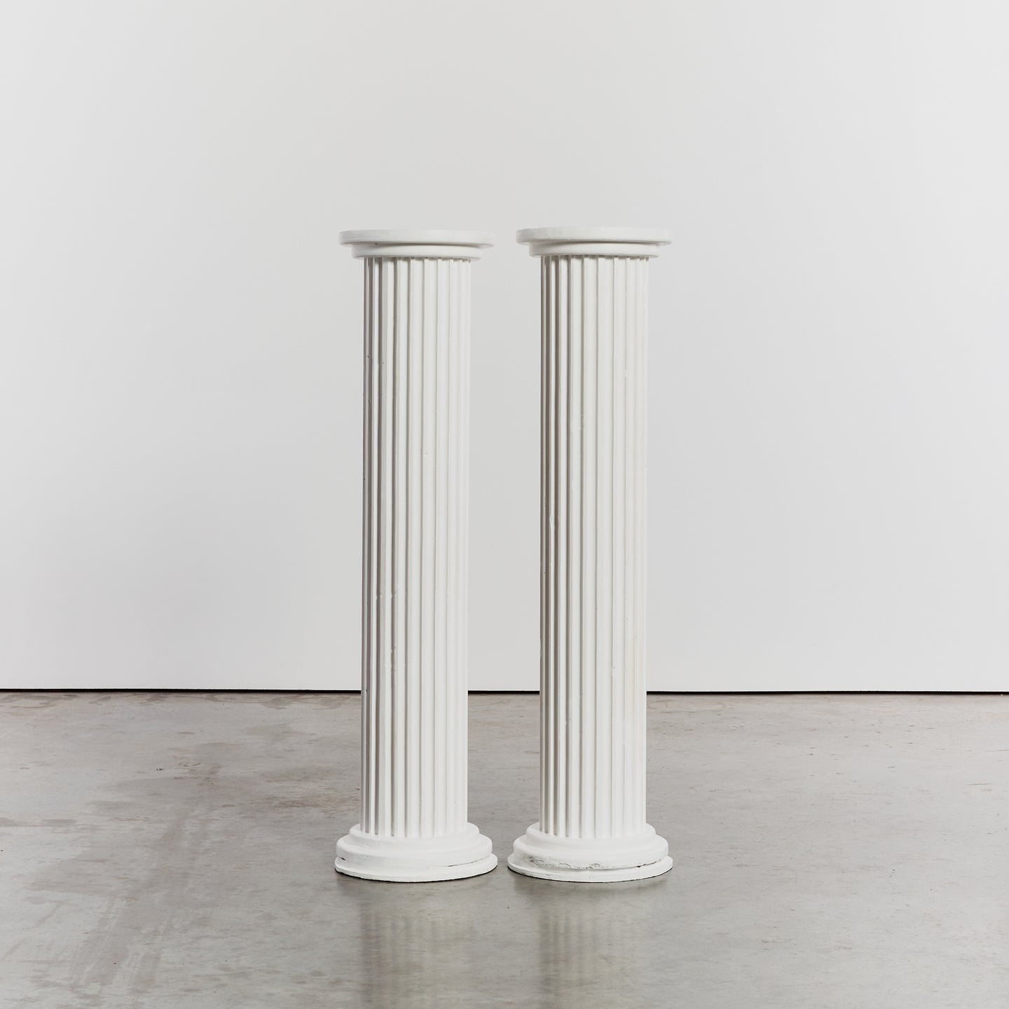 White fluted plaster columns / pair available - HIRE ONLY